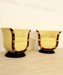 Art Deco tulip armchairs, unique form, highquality leather, macassar wood, highgloss black foot