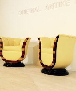 Art Deco tulip armchairs, unique form, highquality leather, macassar wood, highgloss black foot