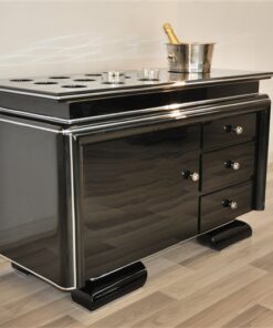Art Deco Barsideboard, classic body, rotating chromebars, clean interior, 9 Whiskey glass inset, 1 big inset for a champagne cooler