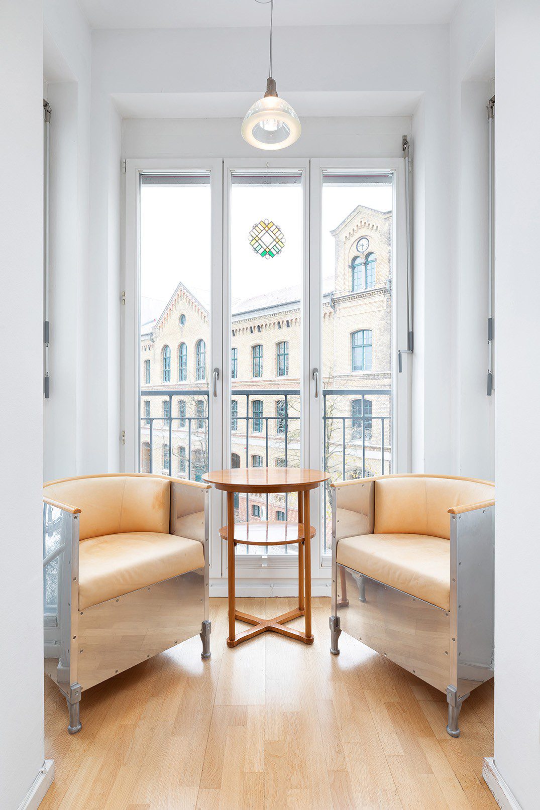 Mats-Theselius-armchairs-and-oval-side.jpg