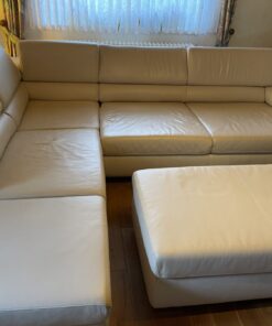 Puro Ecksofa Leder(auch Rückseite), Farbe elfenbein, mit Hocker