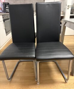 4 Schwingstühle in schwarz/chrom