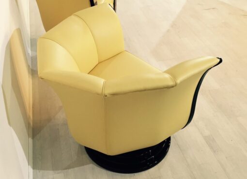 Art Deco tulip armchairs, unique form, highquality leather, macassar wood, highgloss black foot