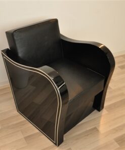 Art Deco armachair, swung armrests, black leather, rotating chromelines