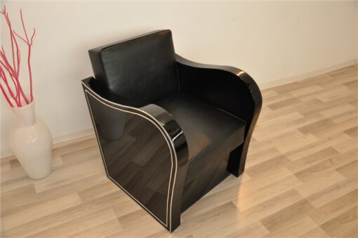 Art Deco armachair, swung armrests, black leather, rotating chromelines
