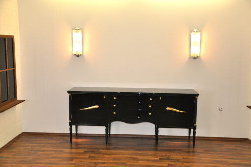 Art Deco Commode, highgloss / black, brass fittings, handpolished, 3 drawers, two shelves