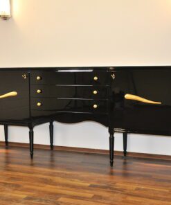 Art Deco Commode, highgloss / black, brass fittings, handpolished, 3 drawers, two shelves