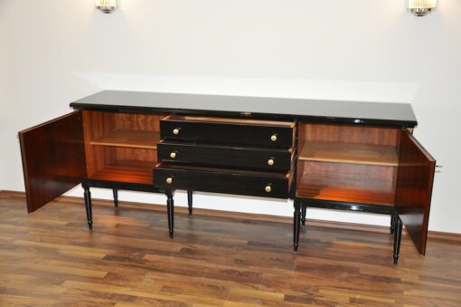 Art Deco Commode, highgloss / black, brass fittings, handpolished, 3 drawers, two shelves