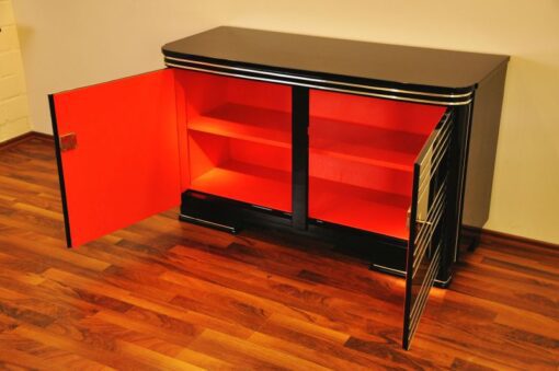 Art Deco Commode, highgloss black with 12-layers of lacquer, beautiful chrome applications on the doors, red interior, unique furniture from france