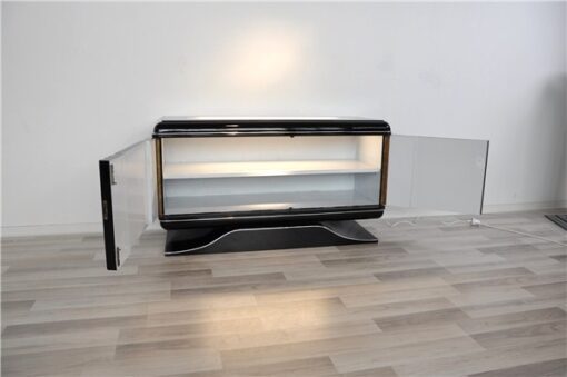 highgloss pianolacquer, classic design with rounded corners, illuminated glass plate, wonderful curved foot