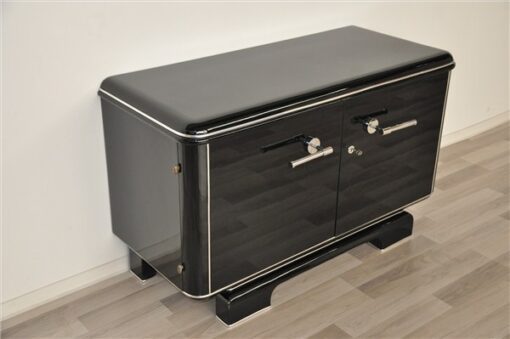 Art Deco Commode, elegant Design with rounded corners, chromelines, big chromehandles, pianolacquer