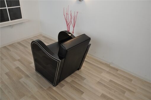 Art Deco armachair, swung armrests, black leather, rotating chromelines