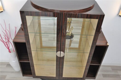 Art Deco Macassar Vitrine, great furnier, mirrored back panel, glas shelves, feet in highgloss black