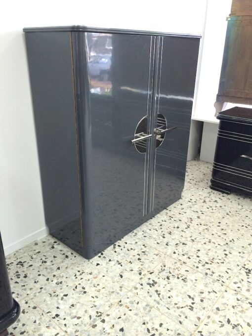 Art Deco Cabinet, circulating chromebars, big chrome fittings, handpolished, shelves and drawers
