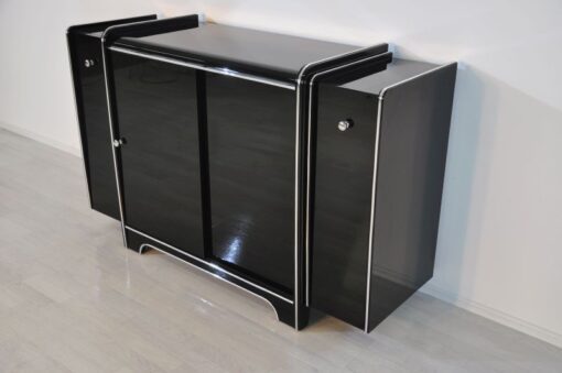 Art Deco Sideboard, highglossblack pianolacquer, fine chromlinies uand chrome handles, glass sliding door