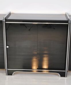 Art Deco Sideboard, highglossblack pianolacquer, fine chromlinies uand chrome handles, glass sliding door