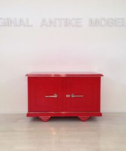 Red Art Deco commode, wonderfull color, big chromehandles, matt black interior, unique design