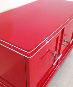 Red Art Deco commode, wonderfull color, big chromehandles, matt black interior, unique design