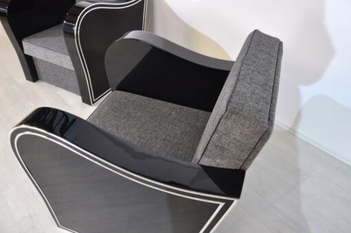 Wonderful Art Deco Armachair with great armrests.curved armrests first class upholstery made of grey fabricchromebarsout of a set of four / also available with black leather