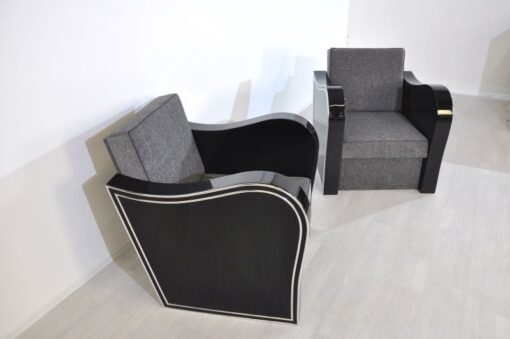 Wonderful Art Deco Armachair with great armrests.curved armrests first class upholstery made of grey fabricchromebarsout of a set of four / also available with black leather