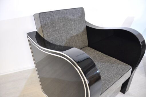 Wonderful Art Deco Armachair with great armrests.curved armrests first class upholstery made of grey fabricchromebarsout of a set of four / also available with black leather