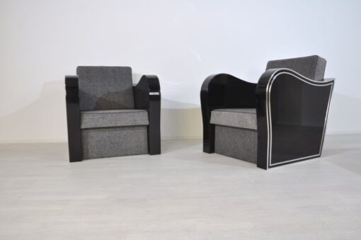 Wonderful Art Deco Armachair with great armrests.curved armrests first class upholstery made of grey fabricchromebarsout of a set of four / also available with black leather