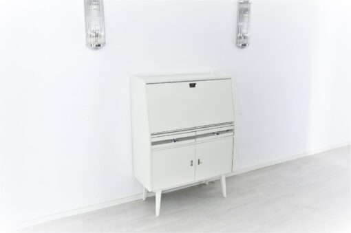 Secretaire from the 50s painted in white high gloss and decorated with chrome details inside with red leather, stunning piece, Rockabilly