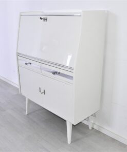 Secretaire from the 50s painted in white high gloss and decorated with chrome details inside with red leather, stunning piece, Rockabilly