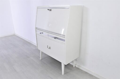 Secretaire from the 50s painted in white high gloss and decorated with chrome details inside with red leather, stunning piece, Rockabilly