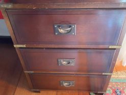 Antique Cabinet With A Green Leather Surface