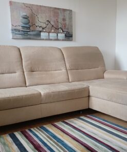 Ecksofa mit Récamiere und Schlaffunktion