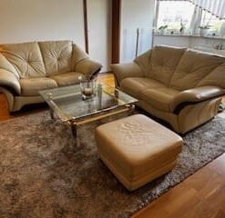 Ledercouch-Garnitur mit Hocker