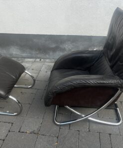 Verchromter Schaukelsessel mit Füshocker von Robert Hausmann 1980